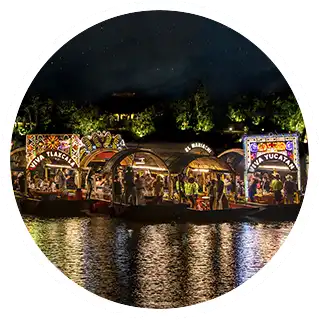 Xoximilco gondolas bathe in the Mexican moonlight