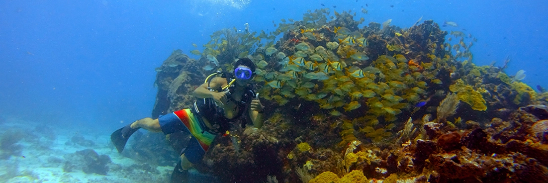 First time diver gives us a big thumbs up from 30ft down.