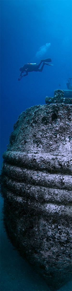 Diver descends onto a shipwreck