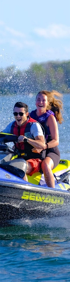 A couple enjoys a jet ski together