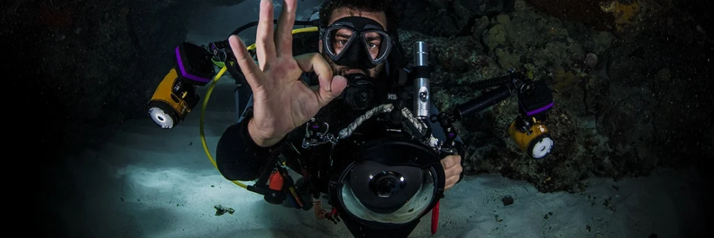 Underwater photographer gives the OK signal