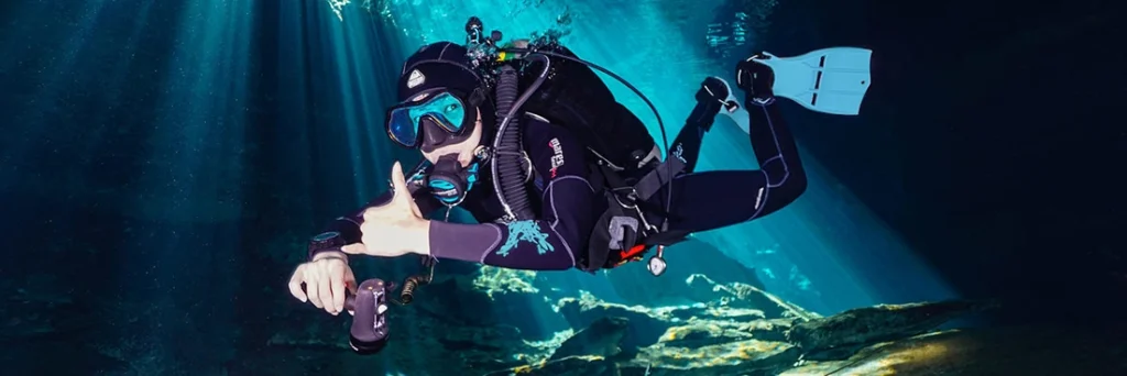 Cavern diver swimming at entrance